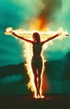edit of a burning naked woman, crucified on a burning cross, burning in a fire.jpg
