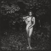 Cindy Crawford by Annie Leibovitz - Eve in the garden on Eden, 1993.jpg