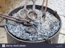 brazier-pliers-and-tools-of-a-medieval-blacksmith-E17A52.jpg