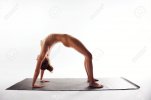 fit 28268809-beautiful-young-naked-woman-arching-her-back-on-yoga-mat-over-white-background-nu...jpg