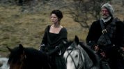 Claire and Dougal riding with soldiers.jpg