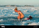 woman-bathing-naked-in-ice-hole-CMW395.jpg