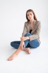 portrait-young-caucasian-attractive-woman-with-long-brown-hair-blue-jeans-suit-jacket-sitting-...jpg