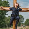 crucified policewoman.jpg