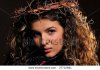 stock-photo-young-woman-wearing-crown-made-of-thorns-27712681.jpg