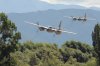 wtr Two Mosquito fighter-bombers roared overhead.jpg