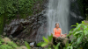 woman-sitting-in-meditation-under-waterfall-in-bali-indonesia_ekggp2jho__F0000.png