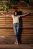 beautful-female-model-crucified-position-wearing-white-t-shirt-jeans-58469707.jpg