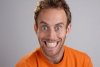 say-cheese-crazy-young-man-grinning-like-a-maniac-stock-photo_csp0945332.jpg