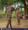 whipping-during-bull-jumping-ceremony-in-hamar-tribe-turmi-omo-valley-CXWT2A.jpg