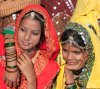 7418645-an-unidentified-group-of-girls-in-colorful-ethnic-attire-attends-at-the-pushkar-fair-p...jpg