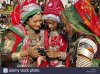 girls-in-traditional-jewellery-and-rajasthani-costume-looking-at-camera-ET0PEF.jpg