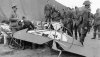 8_Australian airmen pose with the remains of Manfred von Richthofen’s triplane at Bertangles .jpg