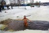 Big-group-of-russian-nudists-swimming-naked-at-winter-10.jpg