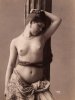 stakeportrait-of-a-naked-young-woman-with-a-braid-of-hair-around-her-hips_a-G-3731900-14258388.jpg