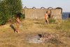 Two-girls-play-badminton-naked-2-700x467.jpg