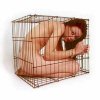 naked girl in cage.jpg