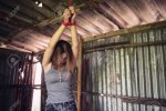 128218955-sad-asian-hostage-woman-tied-hands-with-red-rope-on-dirty-roof-ceiling-in-abandoned-...jpg